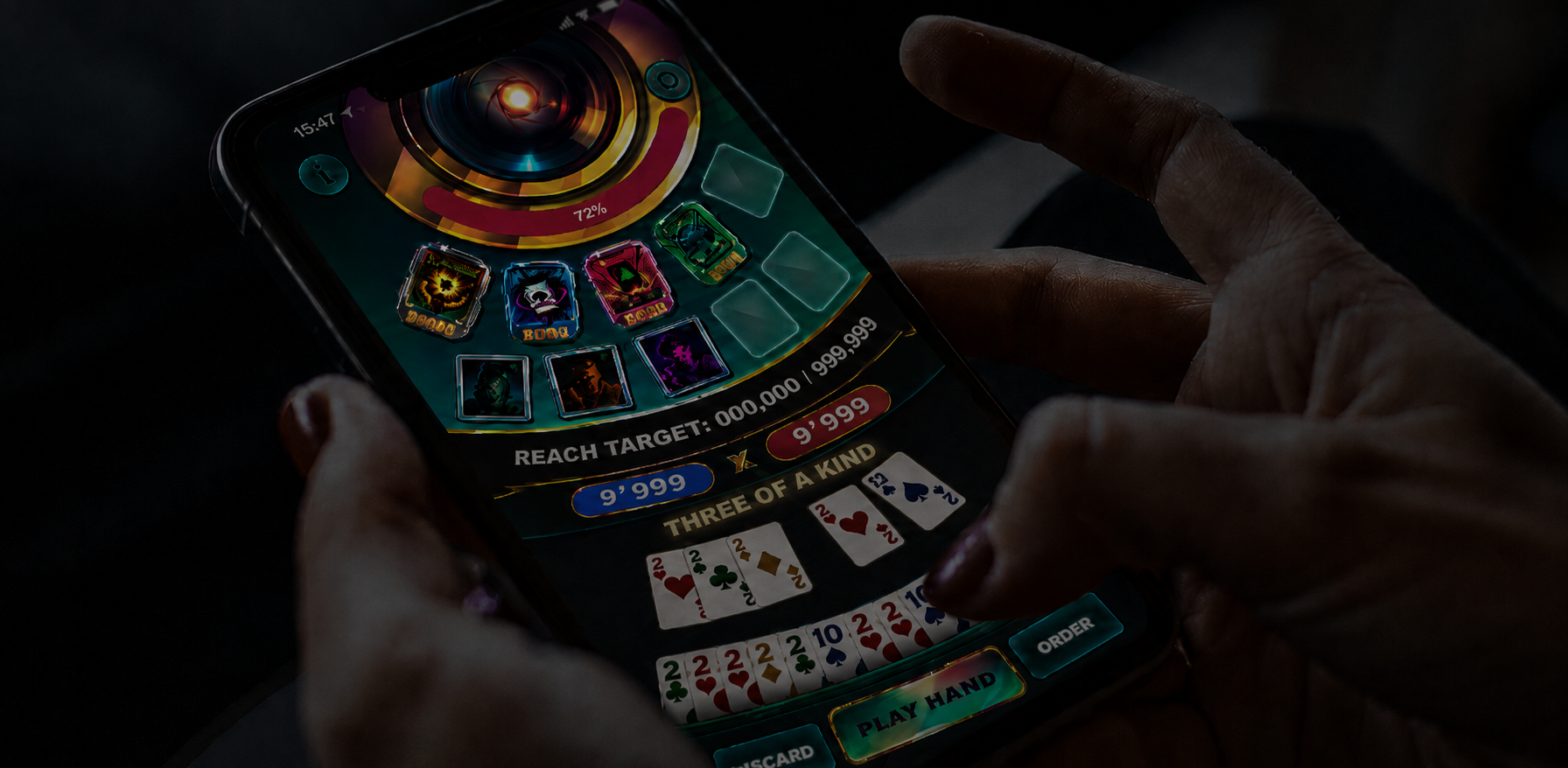 Player playing a card game on a smartphone, with score, target, and hand-of-cards on screen.
